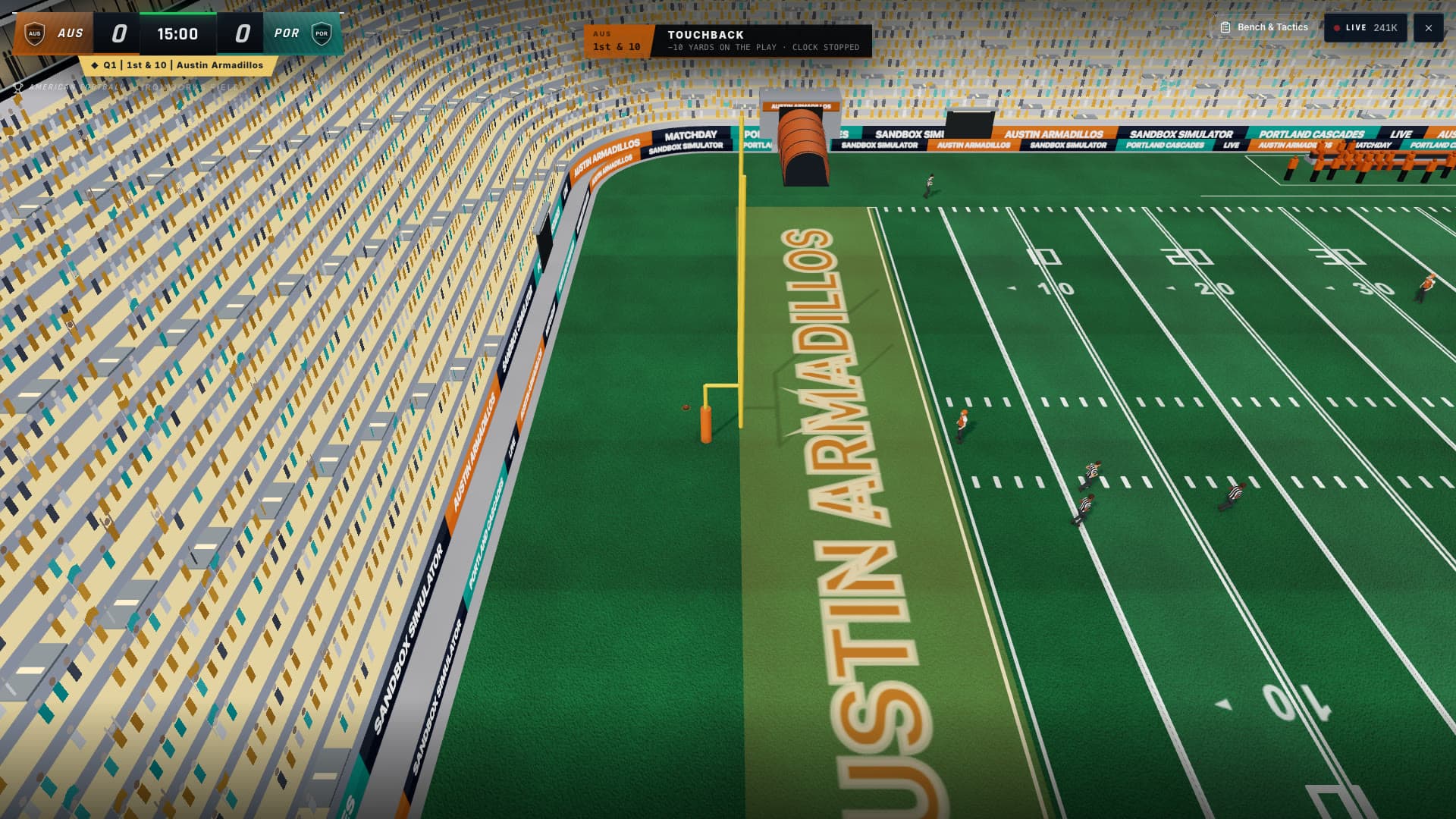 An American football stadium with painted end zone and broadcast banner